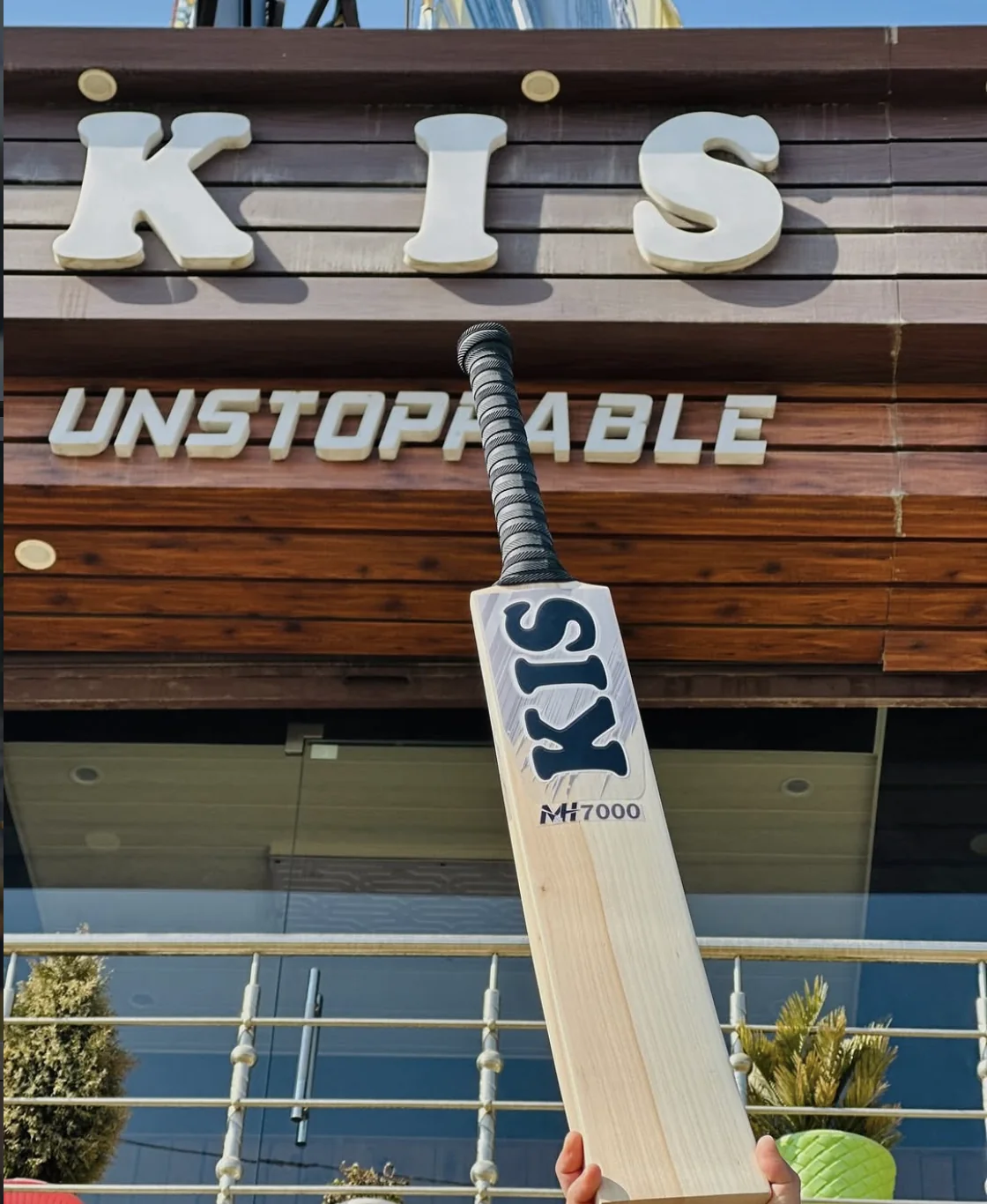 A KIS M&H 7000 held up outside the KIS Unstoppable showroom in Anantnag