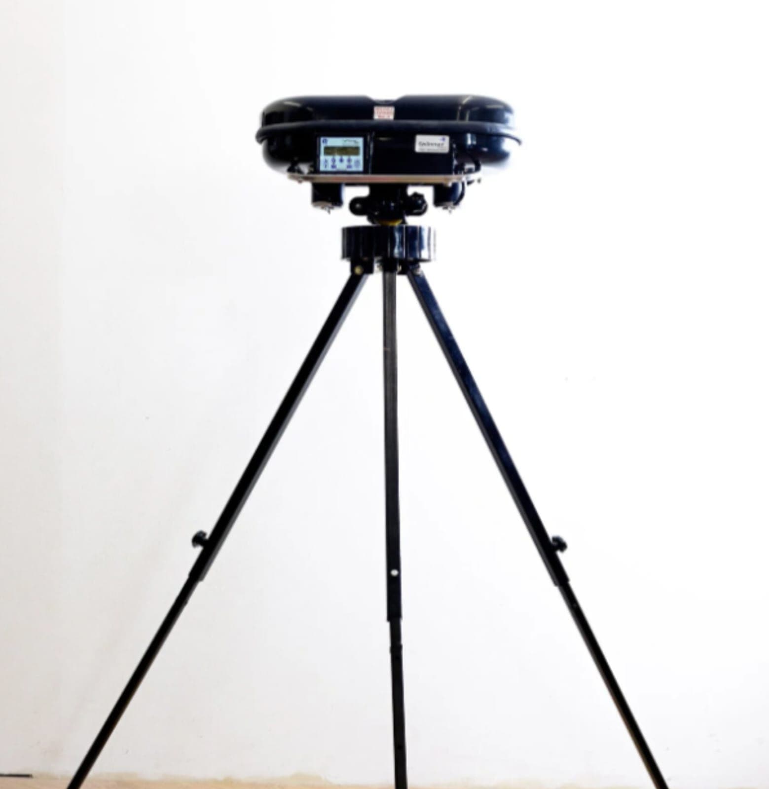 iWinner outdoor tennis machine on its tripod